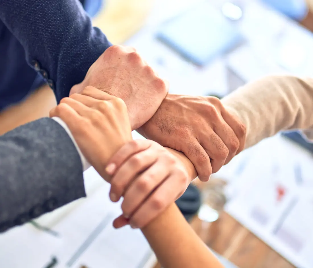 Hands joined in partnership